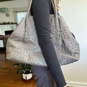 Large ostrich should bag in gray. Very light and comfortable! great condition!